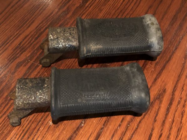 1920's 1930's Vintage motorcycle footrests with Brooks Champion rubbers. This pair with Brooks Champion rubbers would suit a machine with a little patina.