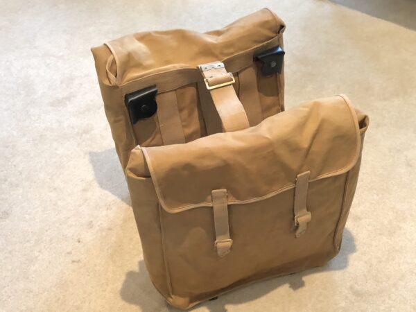 British motorcycle dispatch rider pair of WD side panniers in Khaki brown. War department panniers for military motorcycles. The pannier frames were standard to all motorbikes bikes and include: BSA, Matchless, Norton, Aerial