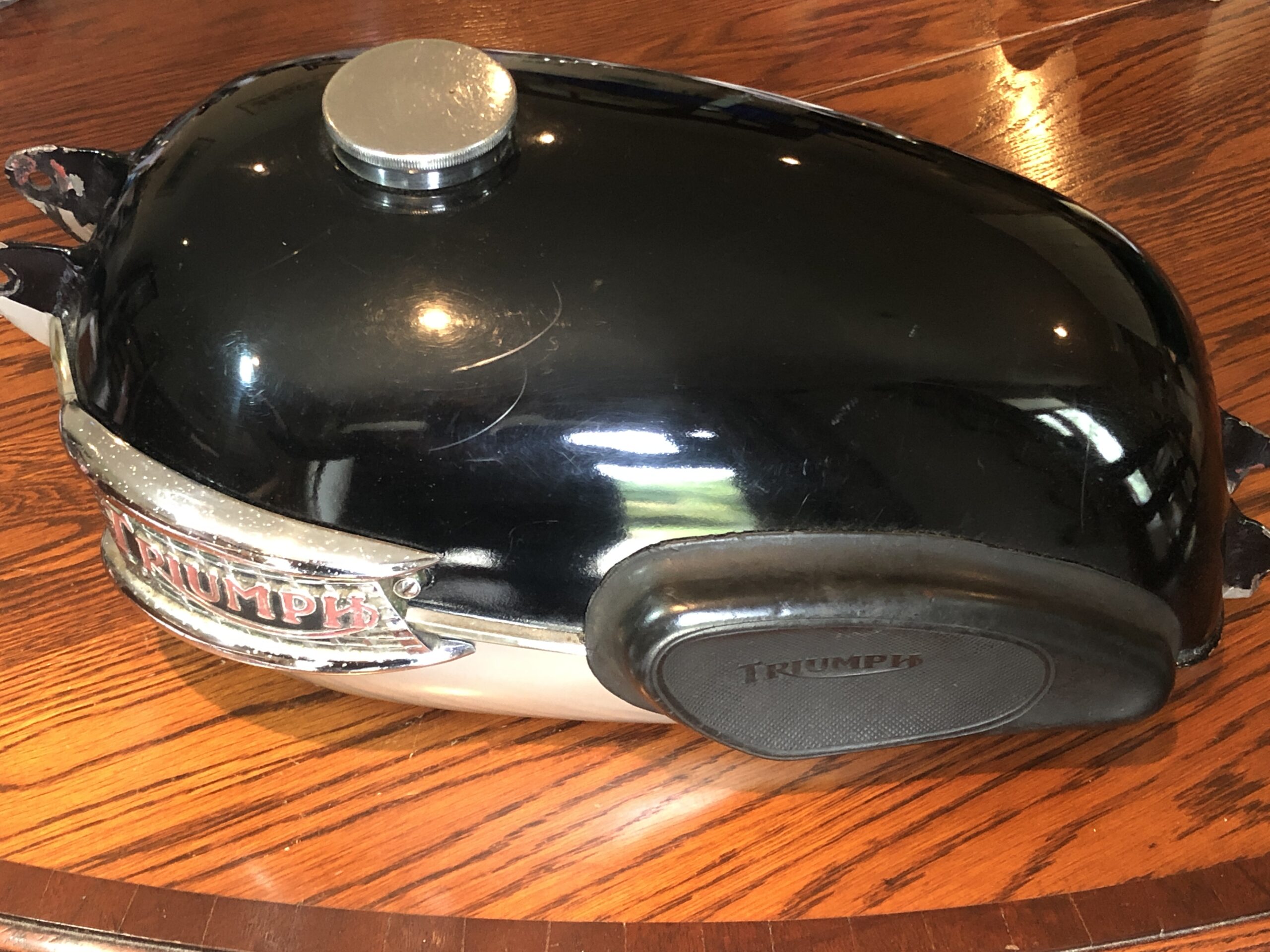 Triumph Tiger Cub T20 fuel tank 3 gallons "humped" shape from 1959. Triumph decided to change the look of the fuel tank to a 3 gallon gas / fuel / petrol tank