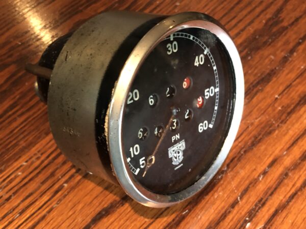 Vintage car Austin Morris Smiths speedometer 60 mph with trip. Antique motorcycle or vintage Austin 7 car silver face Smiths 0-60 m.p.h.