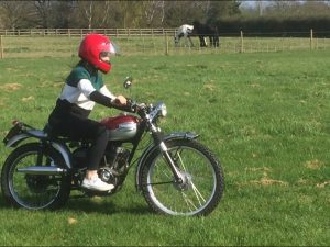 Daughter having her first ride ever, on a Triumph Tiger Cub